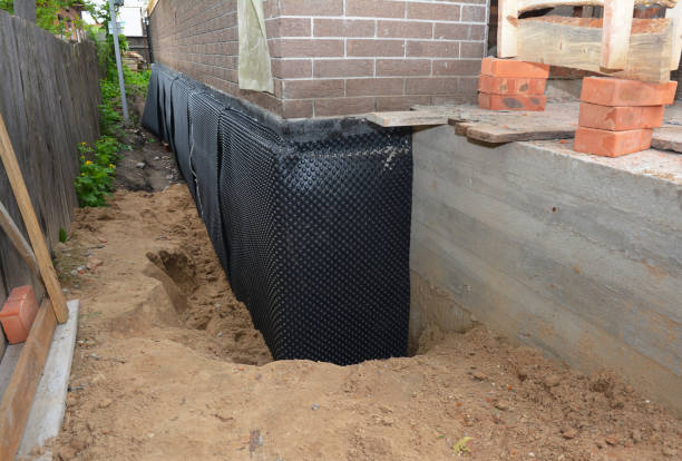 Happy homeowners after waterproofing job in Spiceland